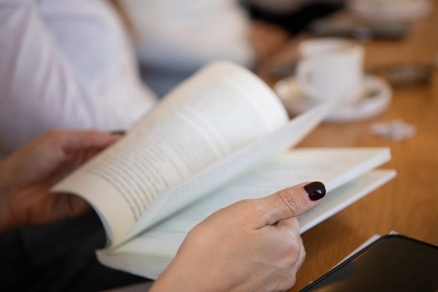 Professionals in a collaborative coaching conversation